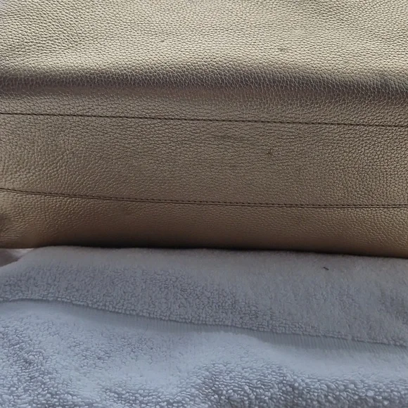 Michael Kors Shimmering  Gold Riversible Tote. - Picture 3 of 14